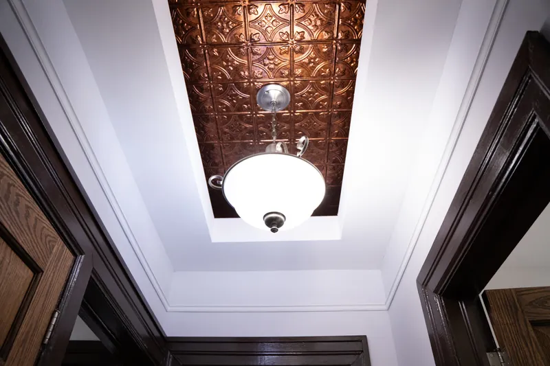 Pressed-tin ceiling medallion and pendant