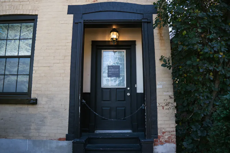 Formal main entrance with leaded-glass door