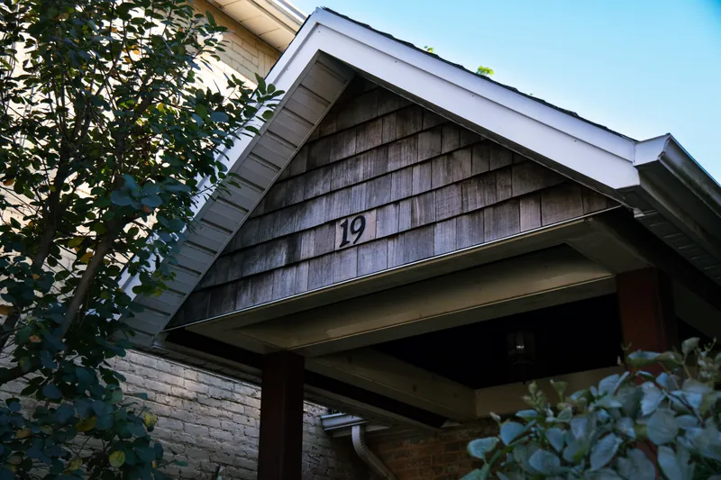 Separate gabled upper-floor entrance