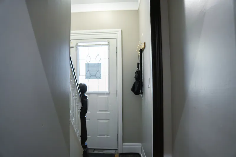 Entry vestibule with leaded-glass door